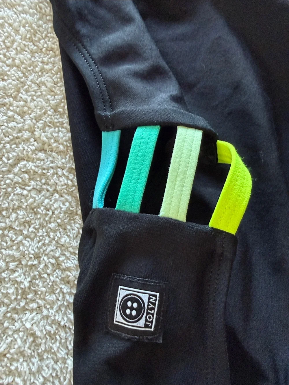 JOLYN Black One-Piece swimsuit with Neon Green & Aqua Stripes